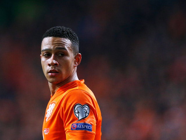 Memphis Depay of Netherlands in action during the UEFA EURO 2016 qualifier match bewteen the Netherlands and Turkey held at Amsterdam Arena on March 28, 2015
