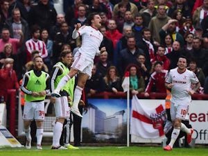 Jelle Vossen of Middlesbrough celebrates as he scores their first goal during the Sky Bet Championship Playoff semi-final first leg match between Brentford and Middlesbrough at Griffin Park on May 8, 2015