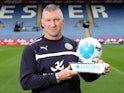Nigel Pearson poses with his manager of the month award for April 2015