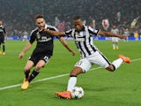 Patrice Evra of Juventus takes on Daniel Carvajal of Real Madrid CF during the UEFA Champions League semi final first leg match between Juventus and Real Madrid CF at Juventus Arena on May 5, 2015