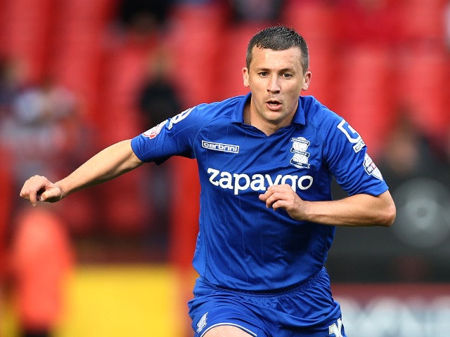 Birmingham City's Paul Caddis looks for a pass during his side's Championship clash with Charlton Athletic on October 4, 2014