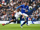 Jermaine Beckford of Preston North End holds off Sam Hird of Chesterfield to score their first goal during the Sky Bet League One Playoff Semi-Final second leg match between Preston North End and Chesterfield at Deepdale on May 10, 2015