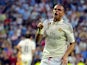 Real Madrid's Portuguese defender Pepe celebrates after scoring during the Spanish league football match Real Madrid CF vs Valencia CF at the Santiago Bernabeu stadium in Madrid on May 9, 2015