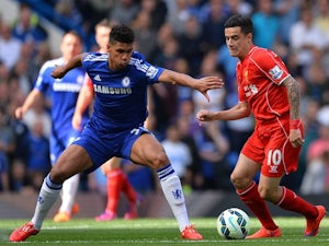 Chelsea's English midfielder Ruben Loftus-Cheek (L) prepares to challenge Liverpool's Brazilian midfielder Philippe Coutinho (R) during the English Premier League football match between Chelsea and Liverpool at Stamford Bridge in London on May 10, 2015