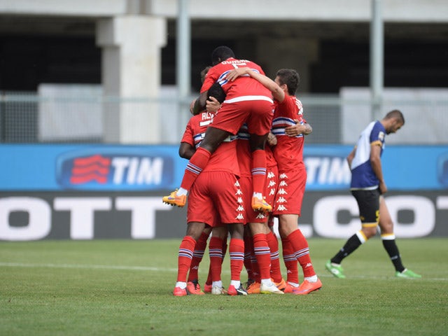 Roberto Soriano of UC Sampdoria is mobbed by team mates after scoring his team's second goal during the Serie A match between Udinese Calcio and UC Sampdoria at Stadio Friuli on May 10, 2015