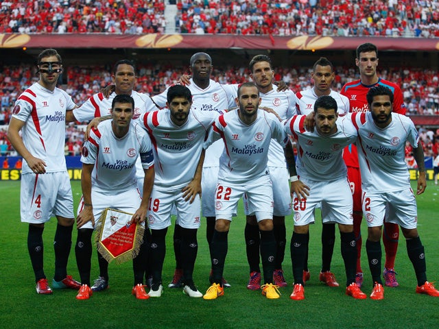 The Sevilla team line up during the UEFA Europa League Semi Final first leg match between FC Sevilla and ACF Fiorentina at Estadio Ramon Sanchez Pizjuan on May 7, 2015