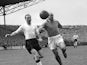 English forward Stanley Matthews and French defender Roger Marche run after the ball during the soccer match between France and England 13 May 1955 