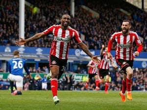 Jermain Defoe of Sunderland celebrates scoring his team's second goal with Steven Fletcher (R) during the Barclays Premier League match between Everton and Sunderland at Goodison Park on May 9, 2015