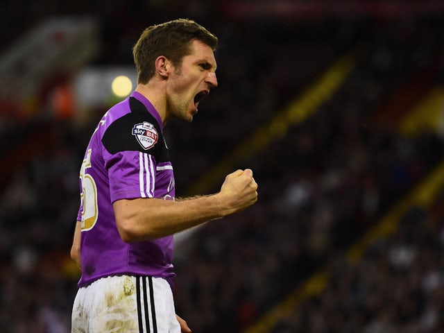 Sam Ricketts of Swindon Town celebrates after scoring the equalising goal during the Sky Bet Championship semi final match first leg match between Sheffield United and Swindon Town at Bramall Lane on May 7, 2015