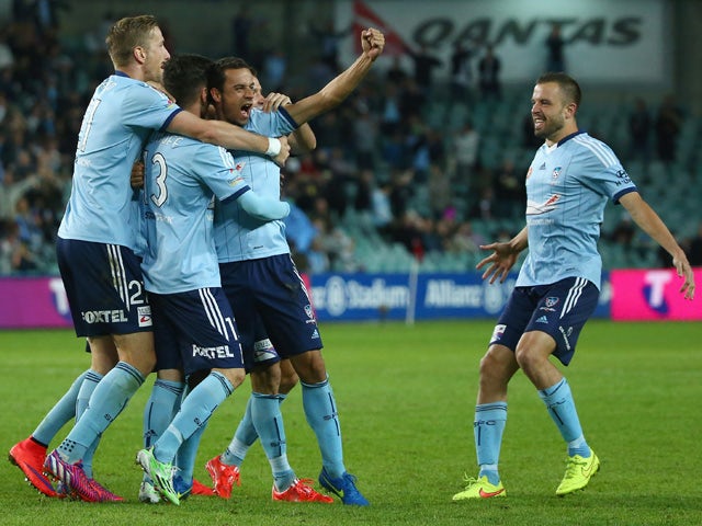Alex Brosque of Sydney FC celebrates with his team mates after scoring a goal during the A-League Semi Final match between Sydney FC and Adelaide United at Allianz Stadium on May 9, 2015