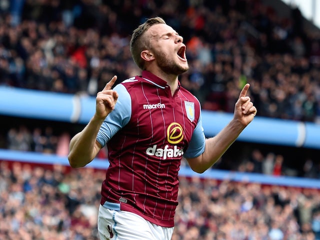 Tom Cleverley of Aston Villa celebrates scoring the opening goal during the Barclays Premier League match between Aston Villa and West Ham United at Villa Park on May 9, 2015