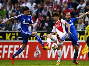 Koln down Schalke to secure Bundesliga survival