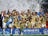 Zenit St Petersburg players celebrate with the trophy after the UEFA Cup final match between Scottish football club Glasgow Rangers and Russian side Zenit St Petersburg at Manchester City stadium on May 14, 2008
