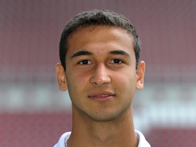 Augsburg's midfielder Akaki Gogia poses during the official pre-seasonal photo opportunity of Germany's football first division Bundesliga team FC Augsburg in Augsburg, southern Germany, on July 26, 2011