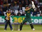 Alex Hales of Nottinghamshire hits the ball towards the boundary, as Tim Ambrose of Warwickshire looks on during the NatWest T20 Blast match between Nottinghamshire and Warwickshire at Trent Bridge on May 15, 2015