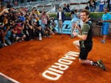 Andy Murray poses with the trophy after beating Rafael Nadal to win the Mutua Madrid Open on May 10, 2015