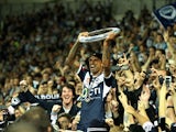 Archie Thompson of Melbourne thanks fans after a win during the 2015 A-League Grand Final match between the Melbourne Victory and Sydney FC at AAMI Park on May 17, 2015