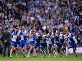 Bristol Rovers players celebrate as Lee Mansell of Bristol Rovers (not pictured) scores the winning penalty in the shoot out during the Vanarama Conference Playoff Final match between Grimsby Town and Bristol Rovers at Wembley Stadium on May 17, 2015