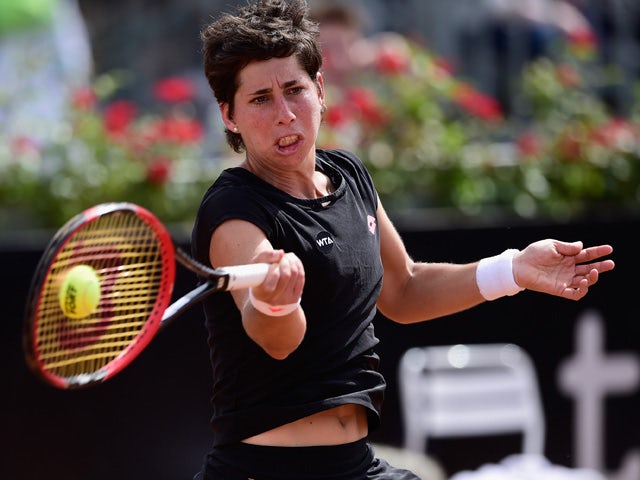 Carla Suarez Navarro of Spain in action during her Quarter Final against Petra Kvitova of Czech Republic on Day Six of The Internazionali BNL d'Italia 2015 at the Foro Italico on May 15, 2015