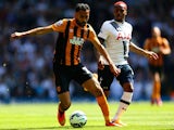 Danny Rose of Spurs closes down Ahmed Elmohamady of Hull City during the Barclays Premier League match between Tottenham Hotspur and Hull City at White Hart Lane on May 16, 2015