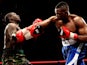 Dillian Whyte connects with Hastings Rassani during their Heavyweight bout at Liverpool Olympia on January 21, 2012