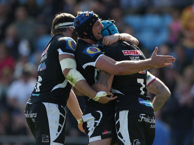 Ben White of Exeter celebrates with team mates after scoring a try during the Aviva Premiership match between Exeter Chiefs and Sale Sharks at Sandy Park on May 16, 2015