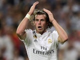 Real Madrid's Welsh forward Gareth Bale gestures during the UEFA Champions League semifinal second leg football match Real Madrid FC vs Juventus at the Santiago Bernabeu stadium in Madrid on May 13, 2015