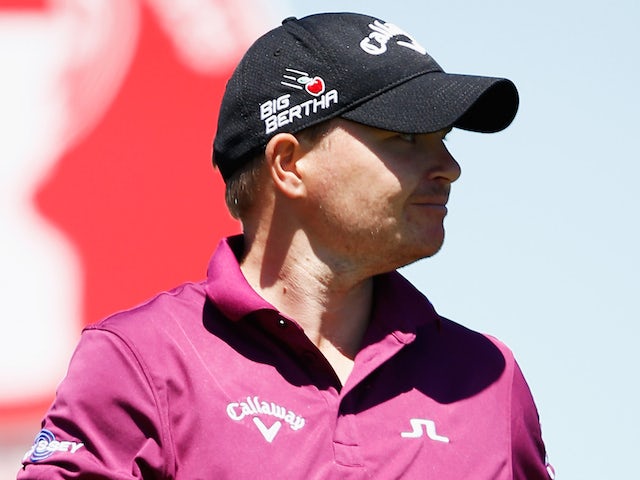 James Morrison of England smiles to the fans after he hits his tee shot on the 1st hole during the final round of the Open de Espana held at Real Club de Golf el Prat on May 17, 2015