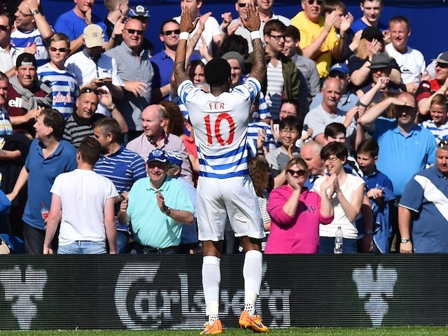 Queens Park Rangers' Dutch midfielder Leroy Fer celebrates after scoring his teams second goal to take a 2-1 lead during the English Premier League football match between Queens Park Rangers and Newcastle United at Loftus Road in London on May 16, 2015
