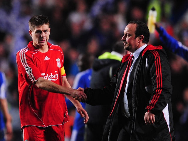 Steven Gerrard of Liverpool is consoled by manager Rafael Benitez in defeat following the UEFA Champions League Semi Final 2nd leg match between Chelsea and Liverpool at Stamford Bridge on April 30, 2008