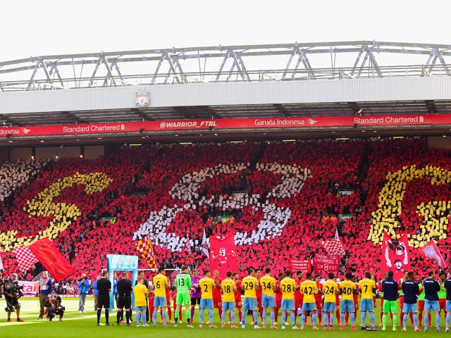 Crystal Palace and Liverpool players form a guard of honour for Steven Gerrard of Liverpool during the Barclays Premier League match between Liverpool and Crystal Palace at Anfield on May 16, 2015