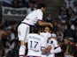 Lyon's French forward Nabil Fekir is congratuled by teamates after scoring during the French L1 football match Olympique Lyonnais against FC Girondins de Bordeaux on May 16, 2015