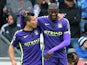 Manchester City's Ivorian midfielder Yaya Toure celebrates scoring the opening goal with Manchester City's Argentinian striker Sergio Aguero during the English Premier League football match between Swansea City and Manchester City at The Liberty Stadium i