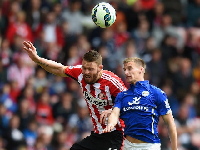 Connor Wickham of Sunderland and Marc Albrighton of Leicester City compete for the ball during the Barclays Premier League match between Sunderland and Leicester City at Stadium of Light on May 16, 2015