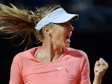 Maria Sharapova of Russia reacts during her match against Victoria Azarenka of Belarus at the WTA Rome Open tennis tournament at the Foro Italico in Rome on May 15, 2015
