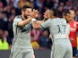 Marseille's French forward Andre-Pierre Gignac is congratulated by Marseille's French forward Dimitri Payet after scoring a goal during the French Ligue 1 football match between Lille and Marseille on May 16, 2015