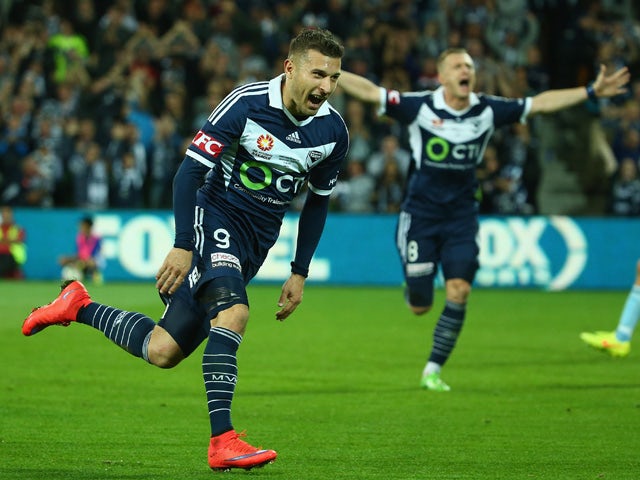 Kosta Barbarouses of the Victory celebrates after scoring a goal during the 2015 A-League Grand Final match between the Melbourne Victory and Sydney FC at AAMI Park on May 17, 2015