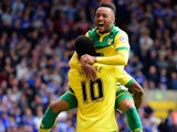 Cameron Jerome of Norwich City (10) celebrates with team mate Nathan Redmond as he scores their third goal during the Sky Bet Championship Playoff semi final second leg match between Norwich City and Ipswich Town at Carrow Road on May 16, 2015