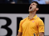 Novak Djokovic of Serbia celebrates wildly after breaking serve during his Quarter Final match against Kei Nishikori of Japan on Day Six of The Internazionali BNL d'Italia 2015 at the Foro Italico on May 15, 2015