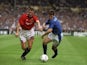 Roy Keane (left) of Manchester United and Andy Hinchcliffe (right) of Everton both race for the ball during the FA Cup Final at Wembley Stadium in London on May 20, 1995