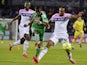 Saint-Etienne's Ivorian forward Max-Alain Gradel shoots to score between Evian's Congolese defender Cedric Mongongu and Evian's Comorian defender Kassim Abdallah during the French L1 football match between Evian Thonon Gaillard (ETG) and Saint-Etienne (AS