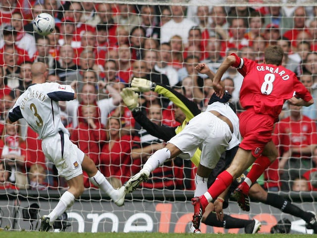 Liverpool's Steven Gerrard (R) puts the ball past West Ham goalkeeper Shaka Hislop to score his team's secong goal during the FA Cup final at the Millennium Stadium in Cardiff, 13 May 2006.