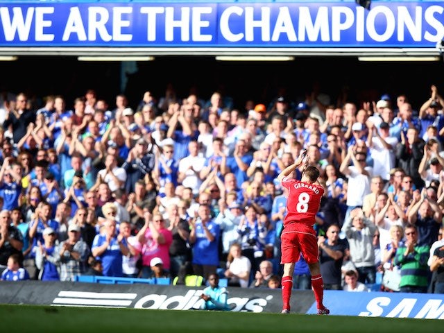 Steven Gerrard applauds the supporters as he leaves the field during the 1-1 draw between Chelsea and Liverpool at Stamford Bridge on May 10, 2015