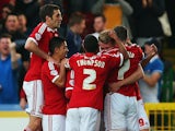 Swindon Town celebrate scoring during the Sky Bet League 1 Playoff Semi-Final between Swindon Town and Sheffiled United at County Ground on May 11, 2015