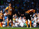 A dejected Tom Huddlestone of Hull City looks on during the Barclays Premier League match between Tottenham Hotspur and Hull City at White Hart Lane on May 16, 2015