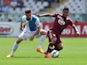 Josef Alexander Martinez of Torino FC in action against Bostjan Cesar of AC Chievo Verona during the Serie A match between Torino FC and AC Chievo Verona at Stadio Olimpico di Torino on May 17, 2015
