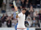 A triumphant Alastair Cook smiles to the crowd after reaching 150 on the fourth day of the First Test between England and New Zealand on May 24, 2015