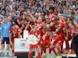Bayern Munich's players celebrates wining their 25th Bundesliga title after German first division Bundesliga football match FC Bayern Munich vs 1 FSV Mainz 05 at the Allianz Arena in Munich, southern Germany on May 23, 2015