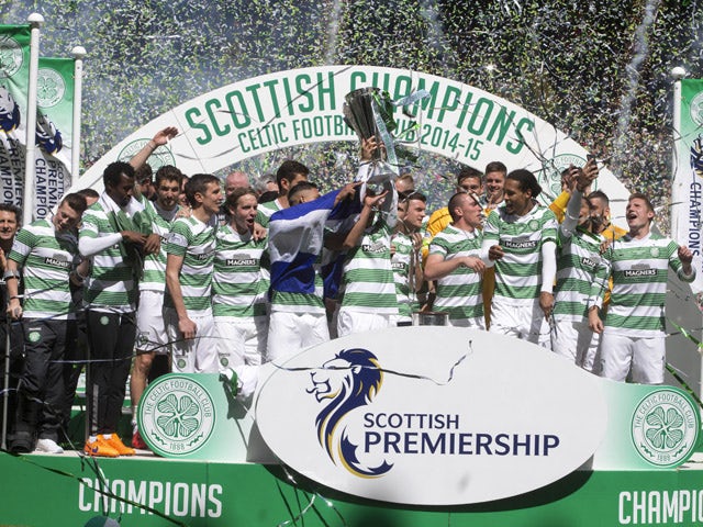 Champions Celtic lift the trophy after winning the Scottish Premiership Match between Celtic and Inverness Caley Thistle at Celtic Park on May 24, 2015