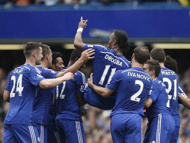 Chelsea's Ivorian striker Didier Drogba is carried off the pitch by teammates after being substituted during the English Premier League football match between Chelsea and Sunderland at Stamford Bridge in London on May 24, 2015